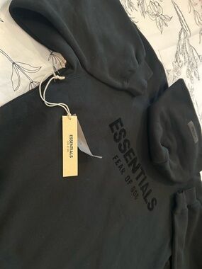 Fear of God ESSENTIALS Black Crewneck Sweatshirt with Embossed Logo